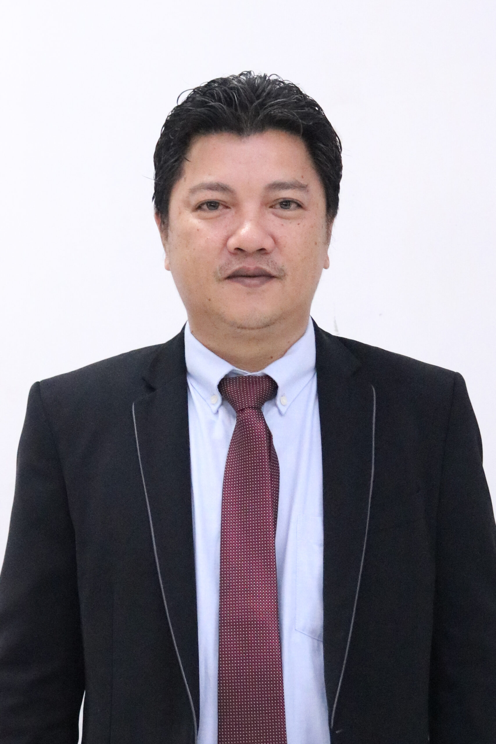 Dr. Alrik Lapian, S.Th., M.Sn