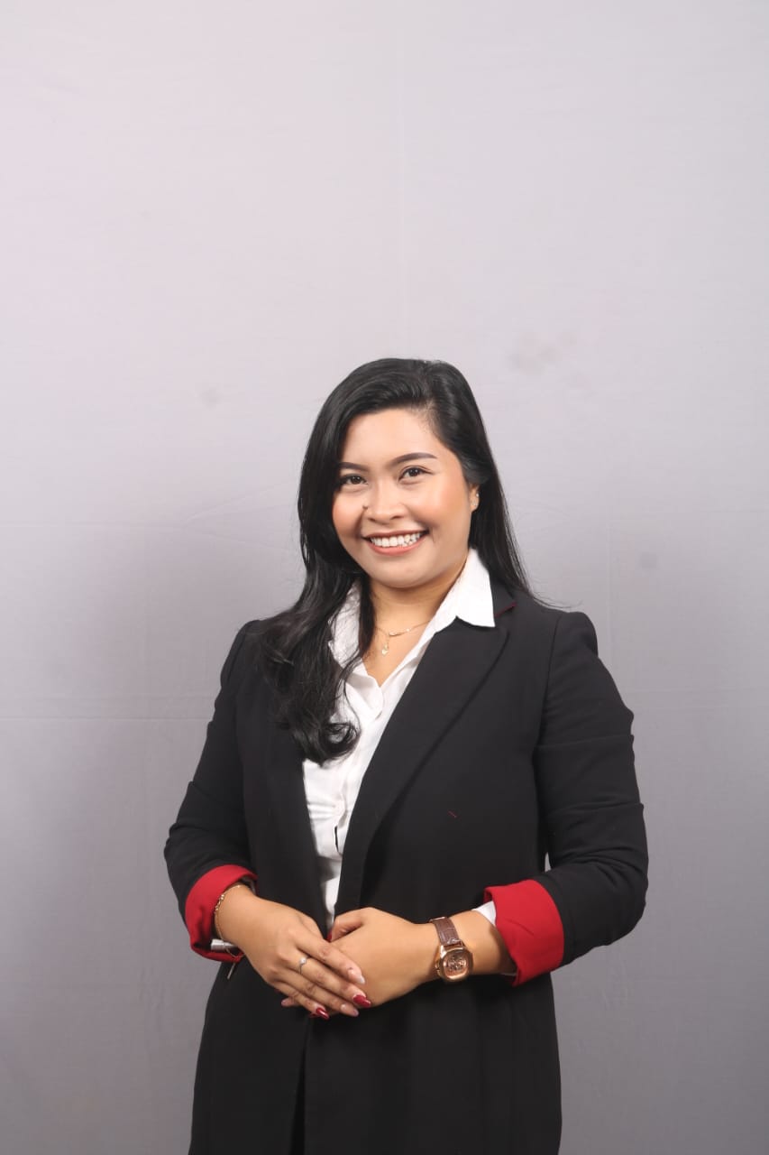 Natalia Olivia Kusuma Dewi Lahamendu, M.Si